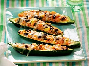 Zucchini Boats with Tomatoes, Rice, and Olives